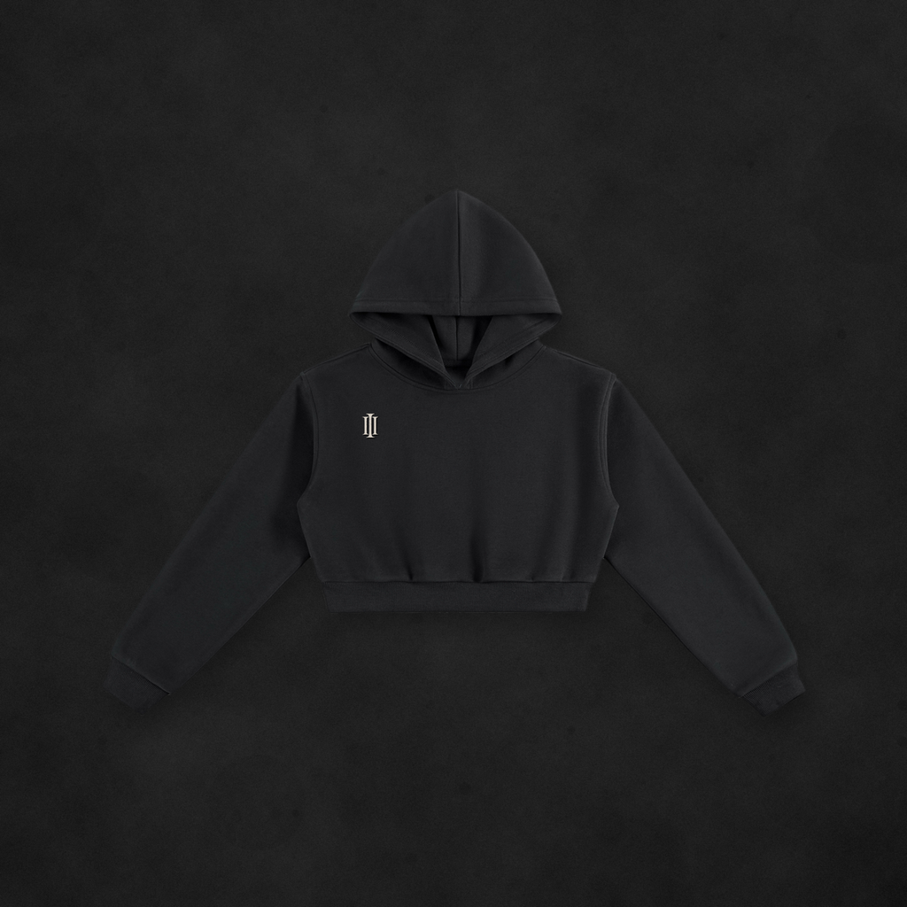 001 CROPPED CREST HOODIE (INK) — on concrete